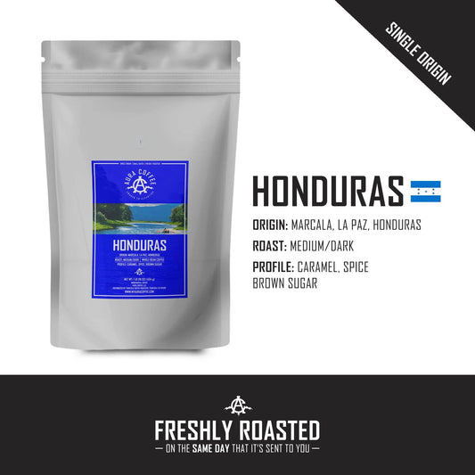 White pouch of Aura Coffee Honduras single-origin coffee with flavor profile and origin.