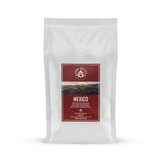 White pouch of Aura Coffee Mexico single-origin coffee with origin and roast details.