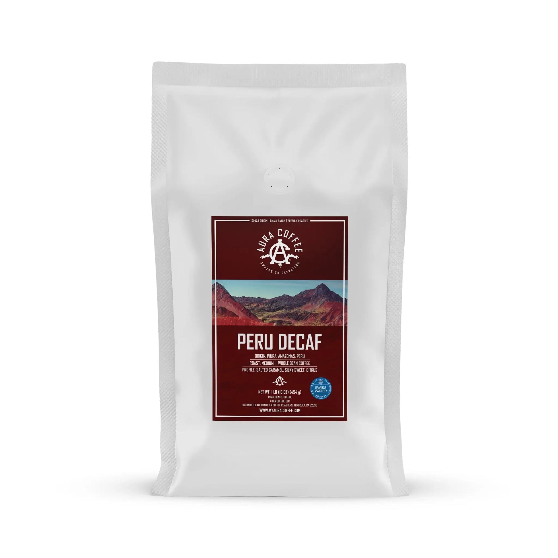 White pouch of Aura Coffee Decaf Peru single-origin coffee.