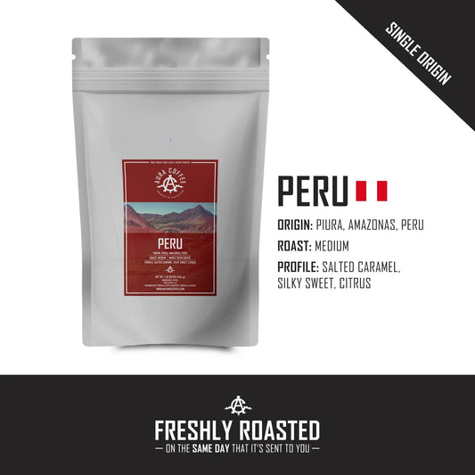 White pouch of Aura Coffee Peru single-origin coffee with origin and roast details