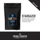Black pouch of Aura Coffee Stargazer Espresso Roast coffee with description.