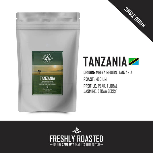 White pouch of Aura Coffee Tanzania single-origin coffee with origin and roast details.